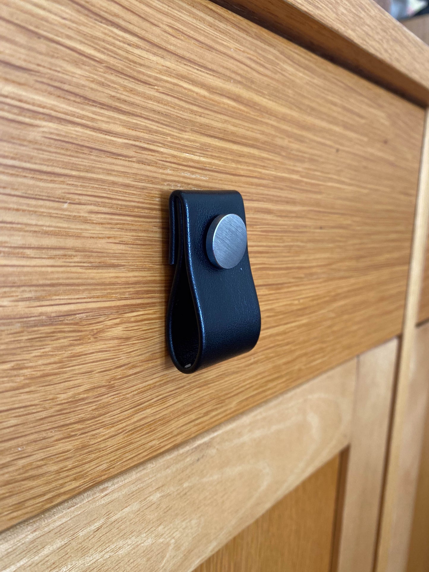 Cupboard door drawer pull, made with apple leather