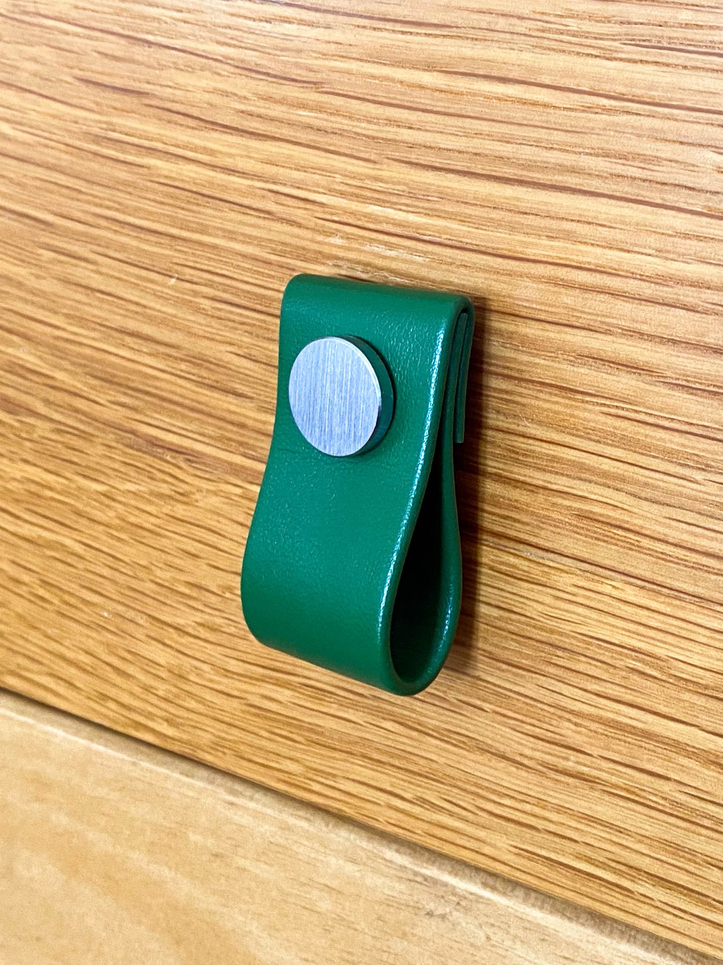 Cupboard door drawer pull, made with apple leather