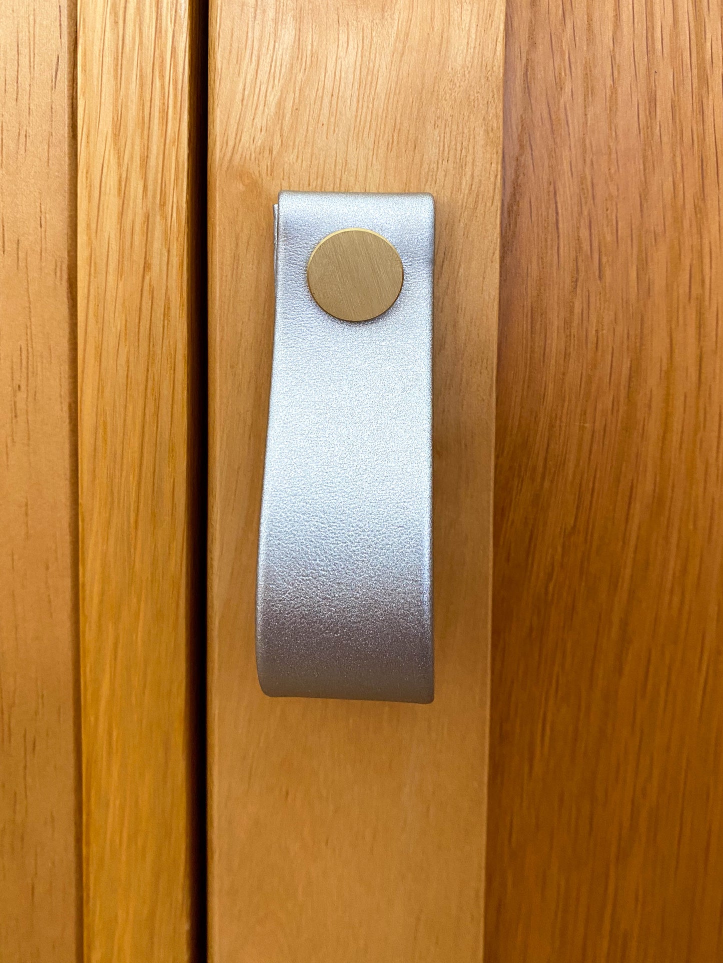 Cupboard door drawer pull, made with apple leather