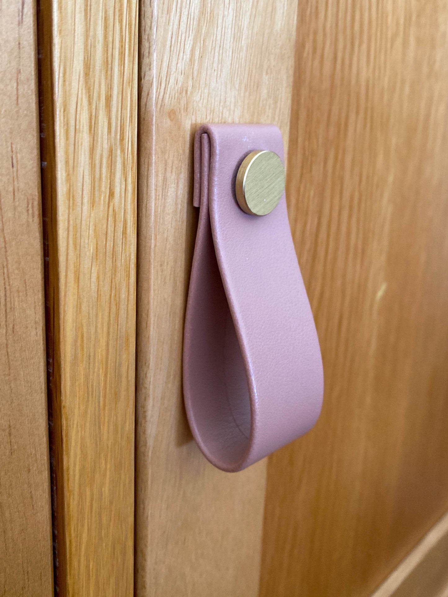 Cupboard door drawer pull, made with apple leather