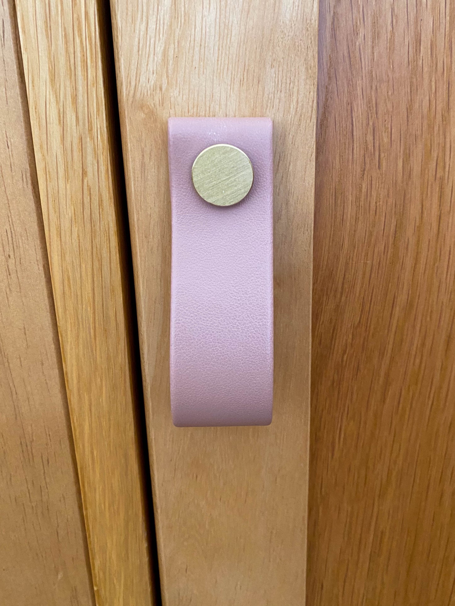 Cupboard door drawer pull, made with apple leather