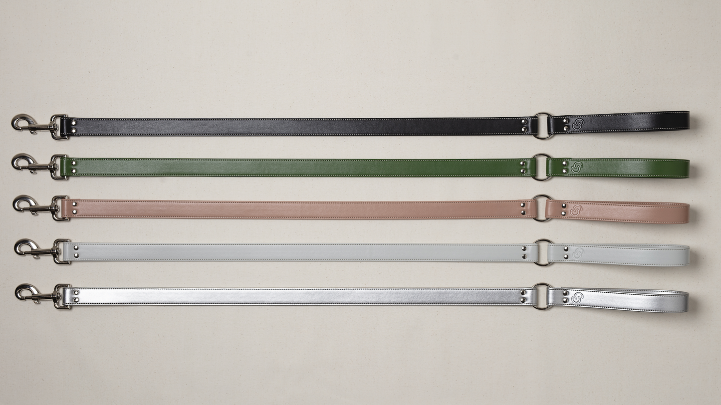 Skylos Collective apple leather dog leads in blush pink, ice blue, forest green, balck and silver. Made in UK with apple leather